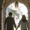 couple walking through archway
