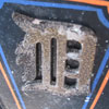 rusted detroit tigers logo at the tiger stadium
